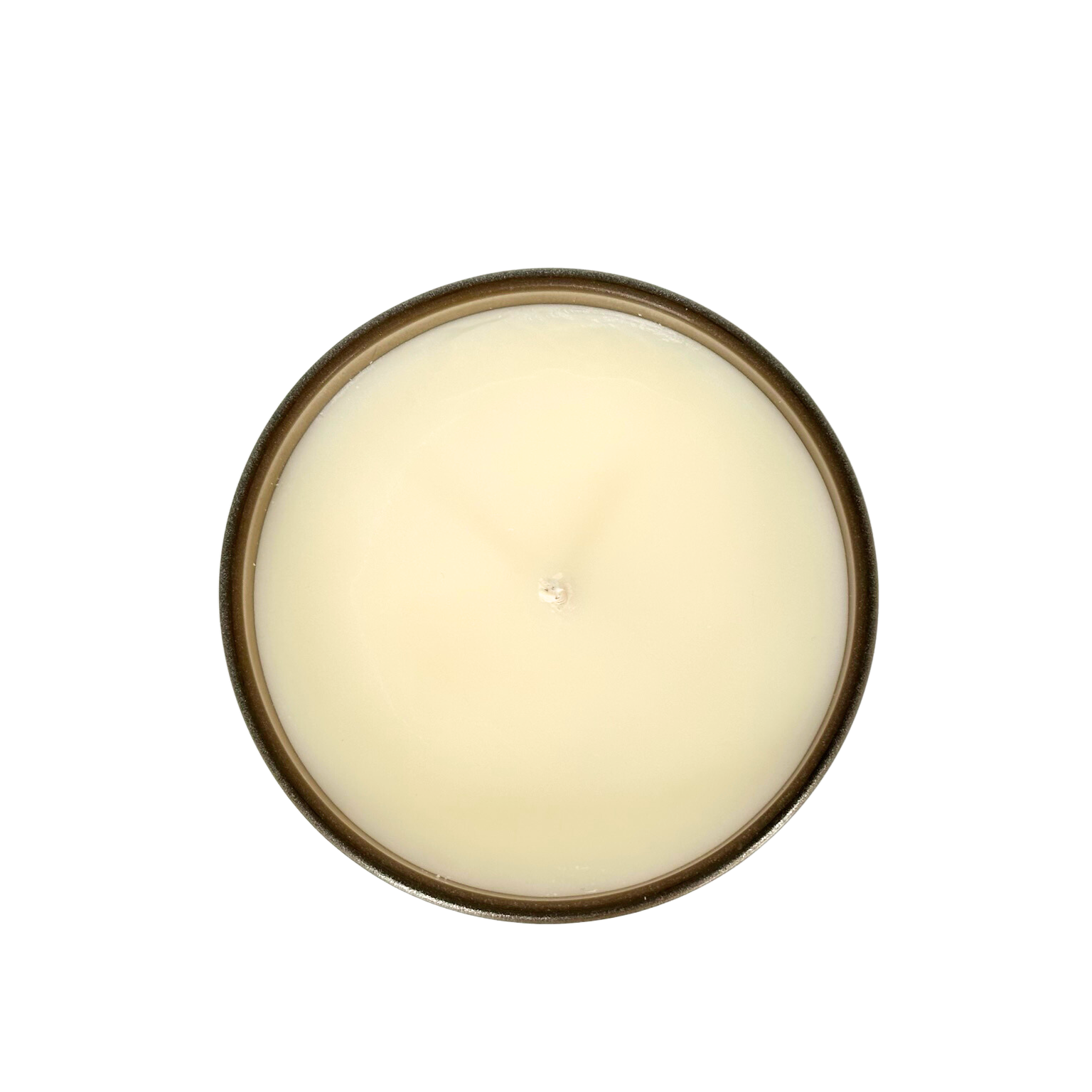 A top-down view of a soy candle is shown. The wax is a natural beige color, with a white cotton wick in the middle.